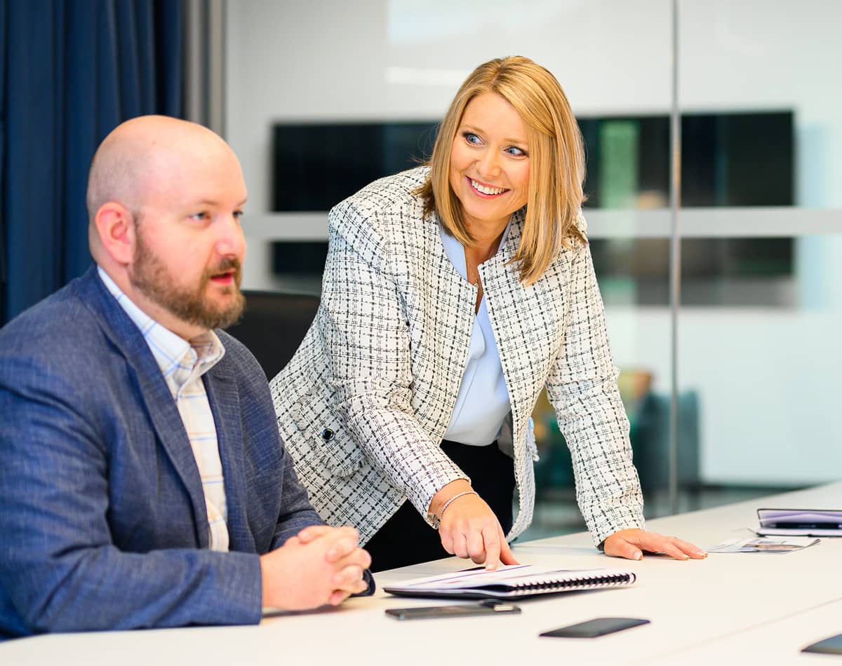 Several professionals meeting at a conference table