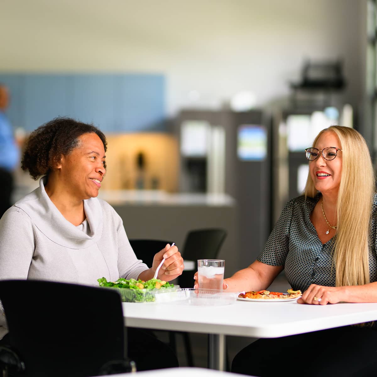 Two women eating lunch together